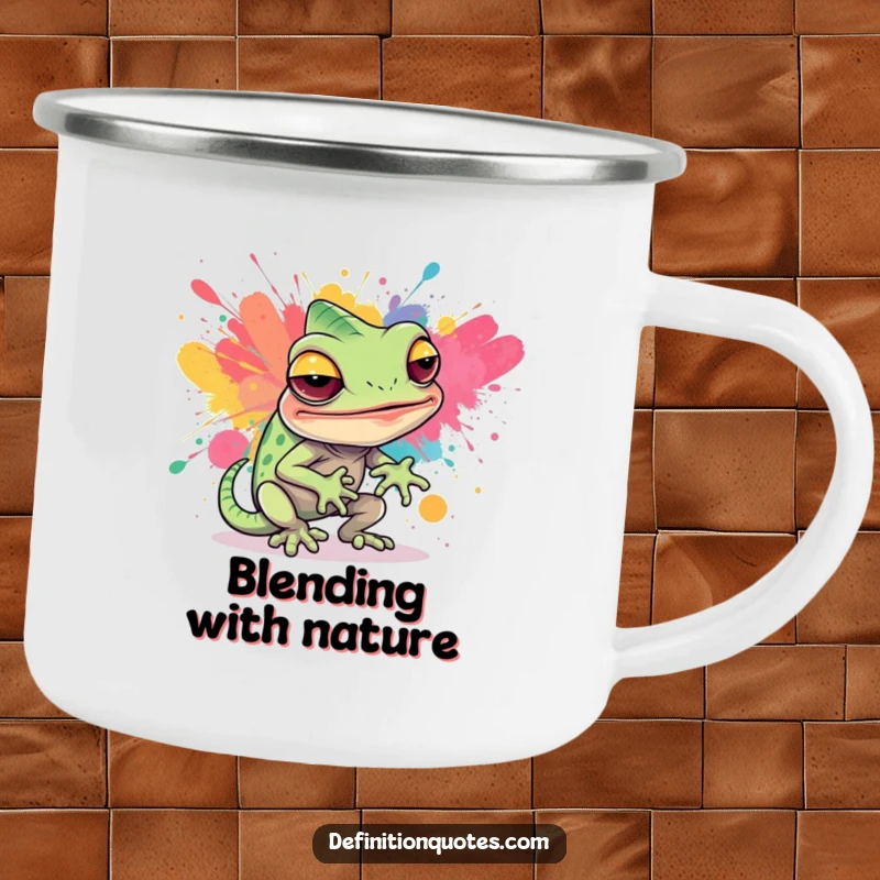 Funny enamel camping mug featuring a sly chameleon hilariously blending into a vibrant abstract paint splatter, perfect for artistic outdoor fun.