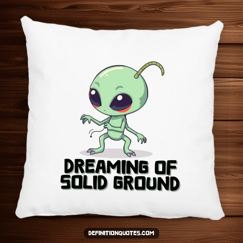 Funny clumsy alien character tripping over its long bendy antennae, depicted on a soft pillow, adding a humorous touch to home decor.