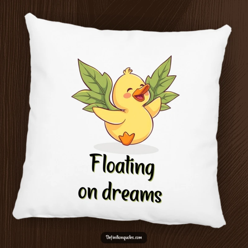 Funny rubber duck with large, mismatched leaf wings, gleefully attempting flight, on a decorative pillow.