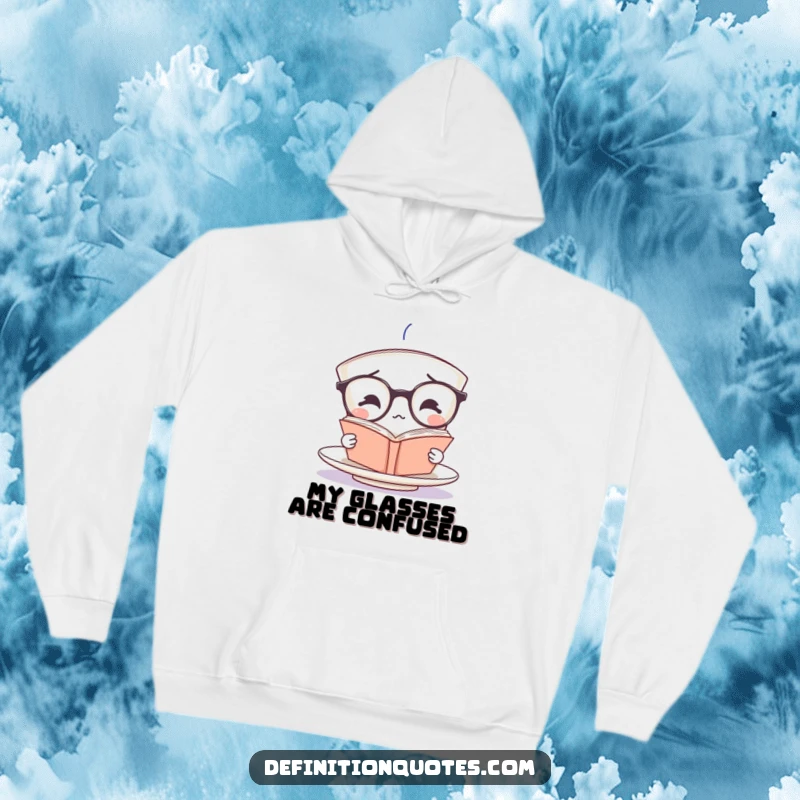 Funny teacup character in oversized spectacles, trying to read an upside-down book, featured on a cozy hoodie.