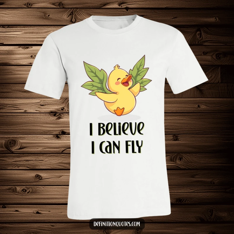 Funny rubber duck attempting flight with large, mismatched leaf wings, a comical design for t-shirts.