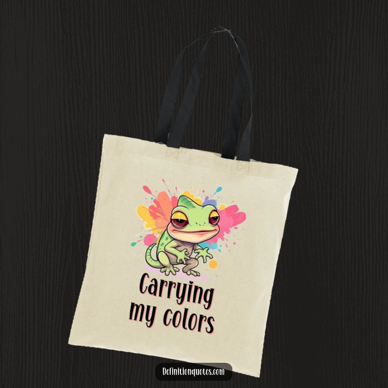 Funny tote bag illustrating a sly chameleon character hilariously attempting to camouflage itself within a vibrant abstract paint splatter.