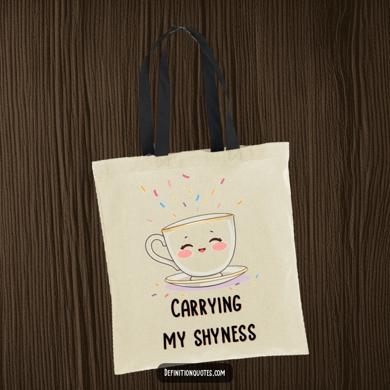 Funny tote bag showcasing a shy teacup character with rosy cheeks hiding from falling confetti, a humorous and practical introvert gift.